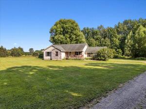 photo 1 of 11265 W Coon Lake Road, Iosco Twp, MI 48892